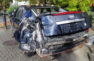 severely damaged 2012 Cadillac for scrap car removal