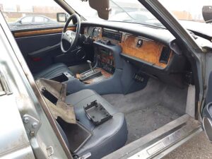 interior of scrap car removal rusty Jaguar
