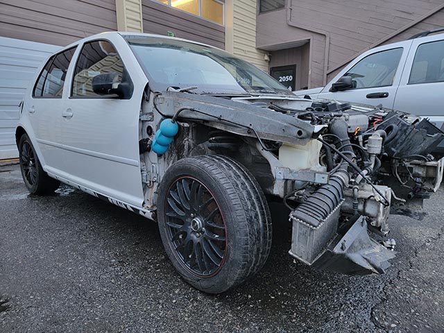 Vancouver scrap car removal of junk VW Golf.