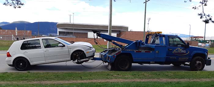 Joe towing a scrap VW Golf
